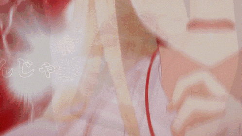 a close up of a girl 's face with her eyes closed