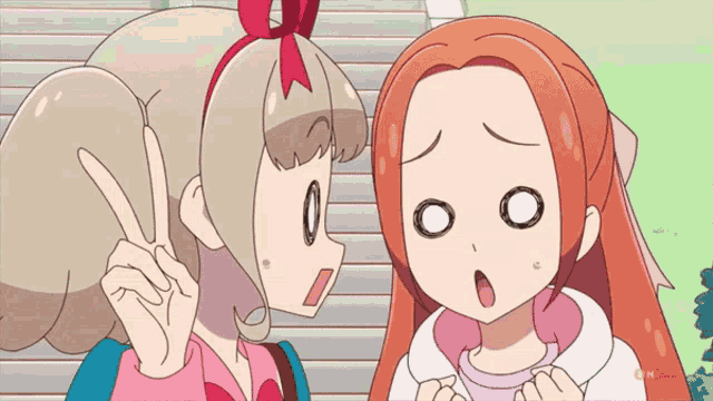 two anime girls are standing next to each other and one has a red bow on her head