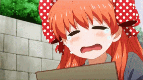 a girl with red hair and polka dot headband is crying while holding a piece of paper .