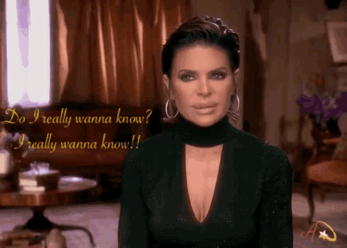 a woman in a black dress says " do i really wanna know ? i really wanna know !! "