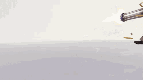 a purple robot is shooting bullets with a white background