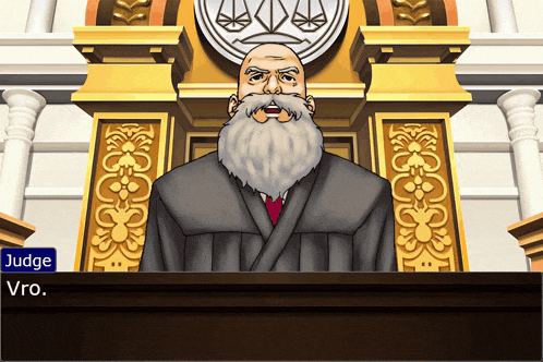a man with a beard stands in front of a judge 's bench and says " judge "