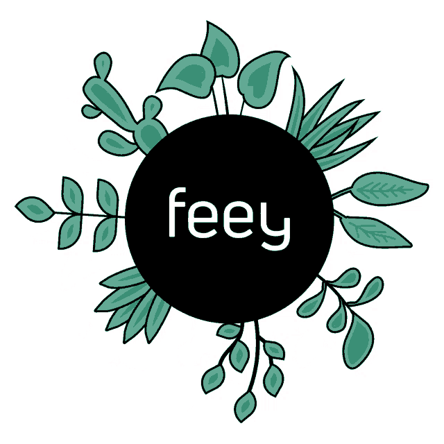 a black circle with the word feey inside of it surrounded by green leaves