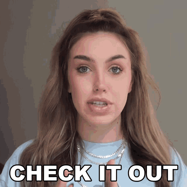 a woman says check it out in front of her