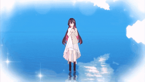 a girl in a white dress stands in the water