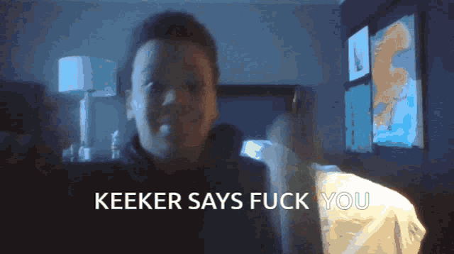 a kid says keeker says fuck you in front of a dark room