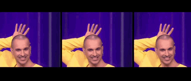 a man in a yellow shirt is making a hand gesture