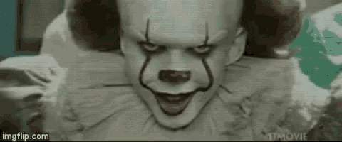 a close up of pennywise the clown from it chapter two making a funny face .