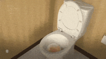 a toilet with a peach in it and a cbs logo in the corner