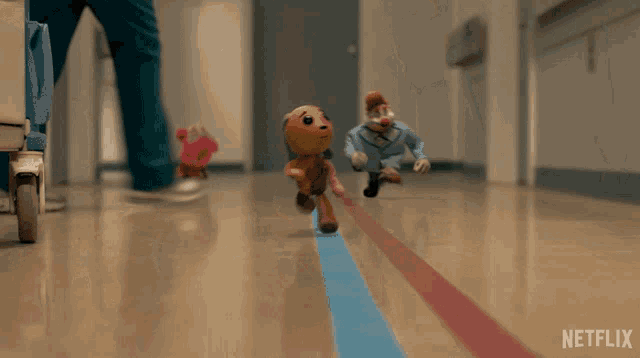 a netflix ad shows a hospital hallway with stuffed animals