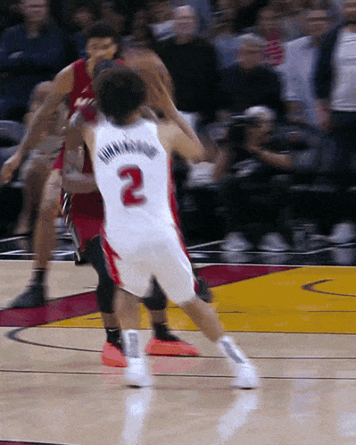 a basketball player has the number 2 on his back
