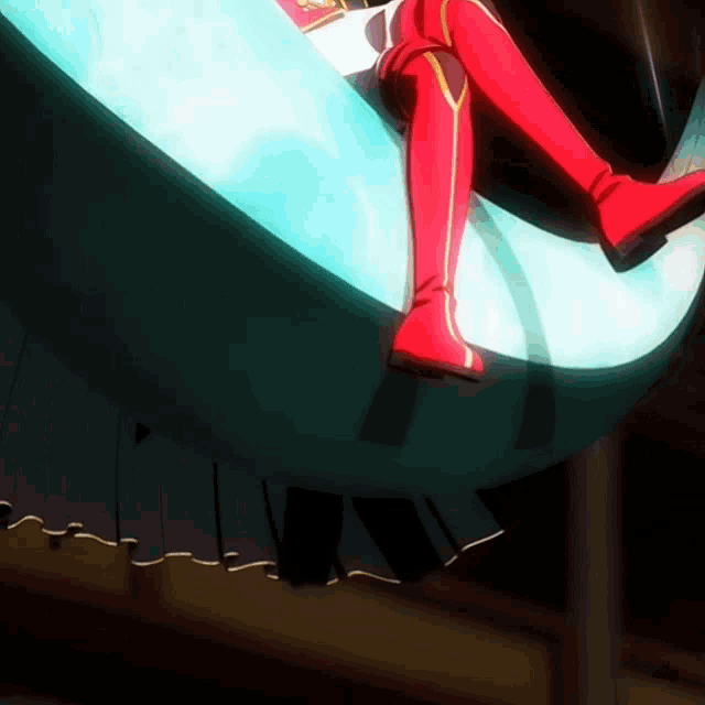 a person wearing red boots is sitting on a blue circle