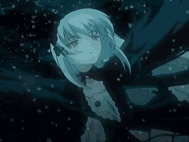 a girl in a black dress is standing in the dark