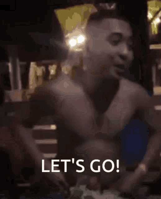 a blurred image of a man with the words let 's go below him