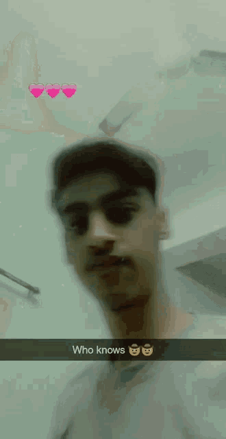 a blurry picture of a man with the words who knows below him