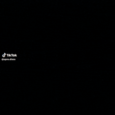 a person riding a bike on a rocky hillside with a tiktok watermark on the bottom right