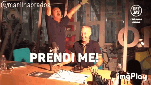 two men sitting in front of a microphone with the words prendi me written below them