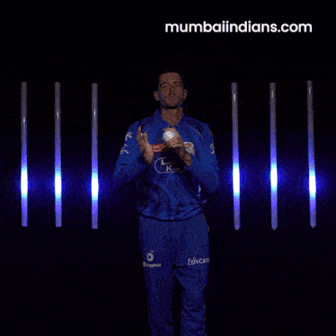 a man wearing a blue jersey with jio on it
