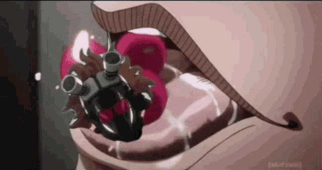 a close up of a person 's mouth with a weapon in it .