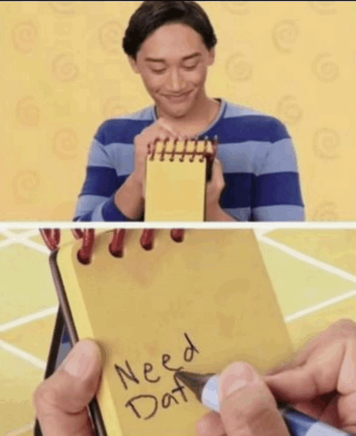 a man holding a notepad that says need dat on it