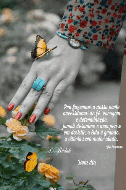 a black and white photo of a woman 's hand with a butterfly