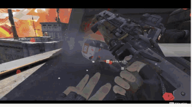 a screenshot of a video game shows a person holding a gun with a red sticker that says high mobility on it