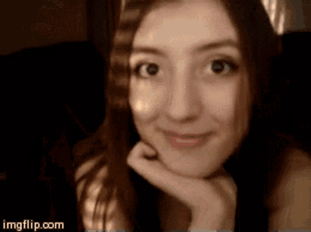 a close up of a woman 's face with imgflip.com at the bottom right