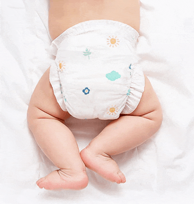 a baby wearing a diaper with flowers and clouds on it
