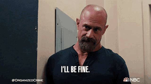 a man with a beard says i 'll be fine on a nbc poster