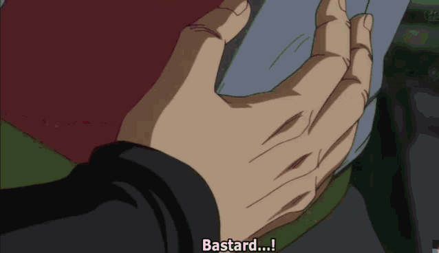 a close up of a person 's hand with bastard written on the bottom right
