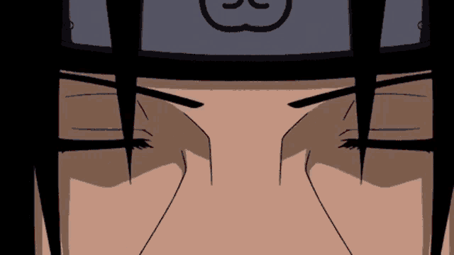a close up of a person 's face with a headband that has the letter s on it