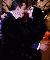 Morticia Gomez Addams GIF - Morticia Gomez Addams Kiss GIFs