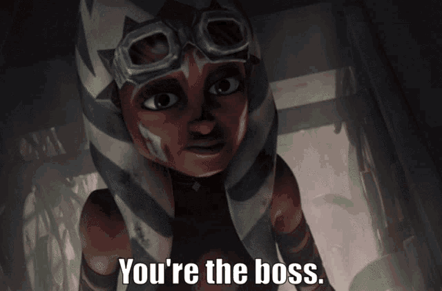 a dark room with the words " you 're the boss "