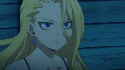 a woman with blonde hair and blue eyes is making a face