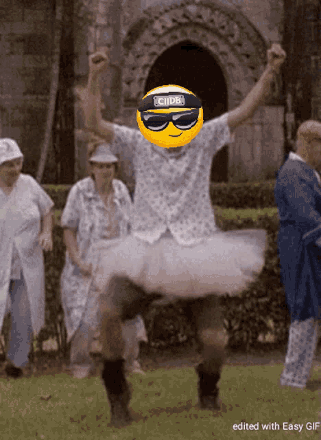 a man wearing sunglasses and a tutu has a smiley face on his head that says cidb on it