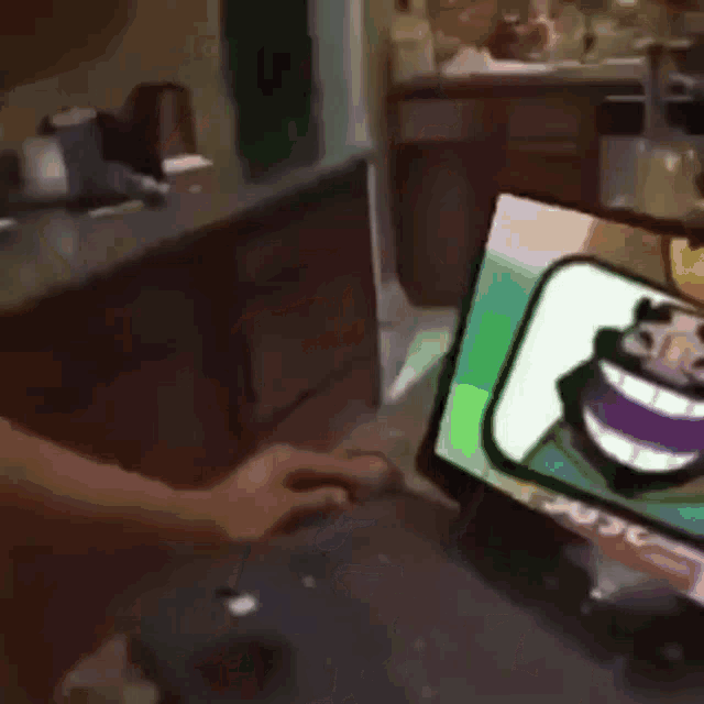 a person is playing clash of clans on a computer