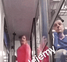 a woman in a red dress is standing next to a man in a blue shirt with the word jenny written on the bottom