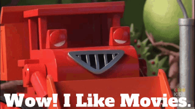 a red toy truck with the words wow i like movies written below it