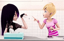 two cartoon girls are standing next to each other in a bathroom talking .