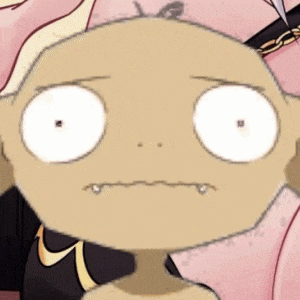 a close up of a cartoon character 's face with big white eyes and a funny face .