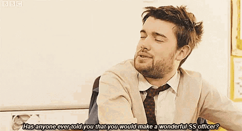 a man with a beard and tie is talking to someone with bbc written in the corner