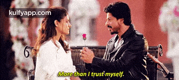 a man is giving a woman a rose and says more than i trust myself