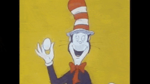 dr. seuss ' cat in the hat is holding an egg in his hand .