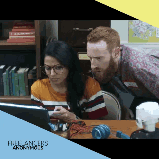 an ad for freelancers anonymous shows a man and a woman looking at a tablet