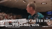 a man in a green shirt is standing in front of a crowd and says `` jeff saturday after his first nfl win ''