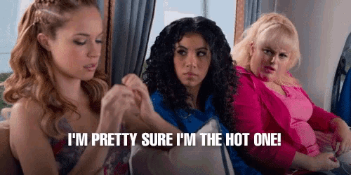 three women are sitting next to each other and one of them is saying i 'm pretty sure i 'm the hot one
