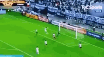 a soccer game is being played on a field with toyota advertisements on the sidelines