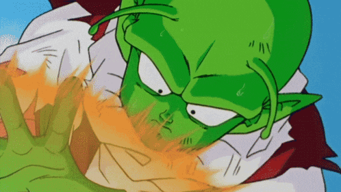 a close up of a cartoon character 's face with a flame coming out of his hand