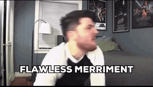 a man is making a funny face in a bedroom with the words `` flawless merriment '' .