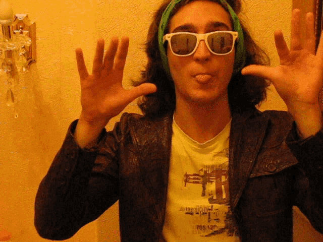 a man wearing sunglasses and a t-shirt that says albert city